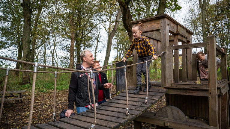 A family enjoying the Delaval Playdium in autumn at Seaton Delaval Hall Northumberland
